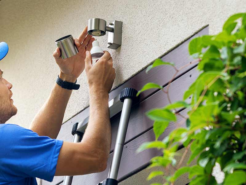 Fitting a new light bulb in an exterior fitting